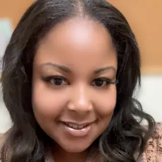 Black Female Therapist working with women and teens